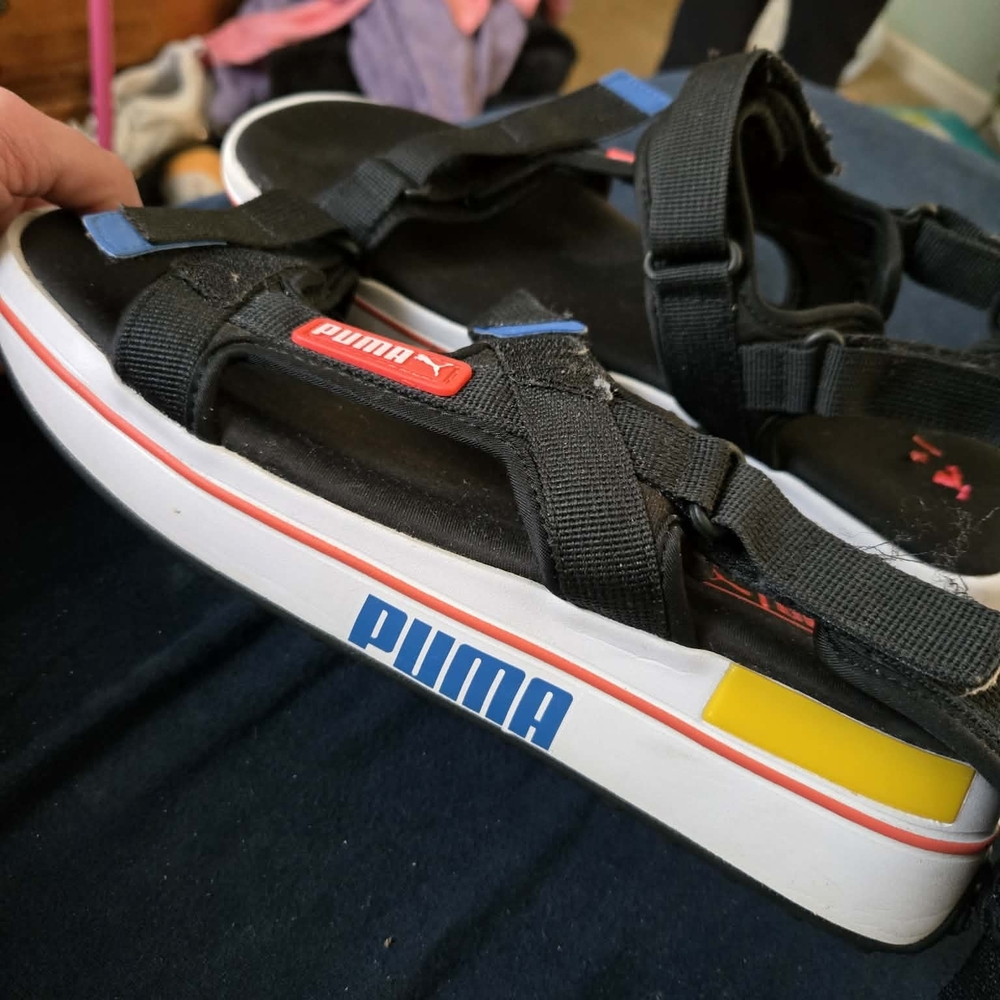Puma Kids Black Sandals with Red and Yellow Accents